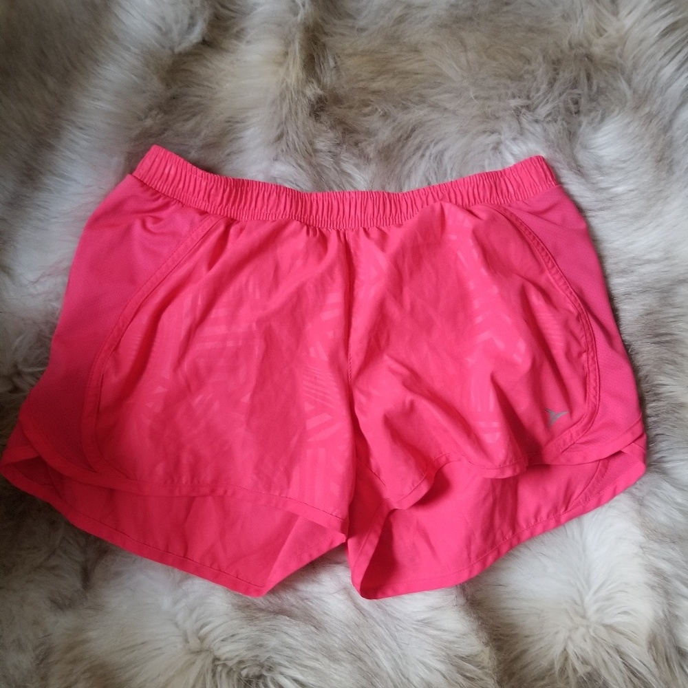 Neon pink running shorts